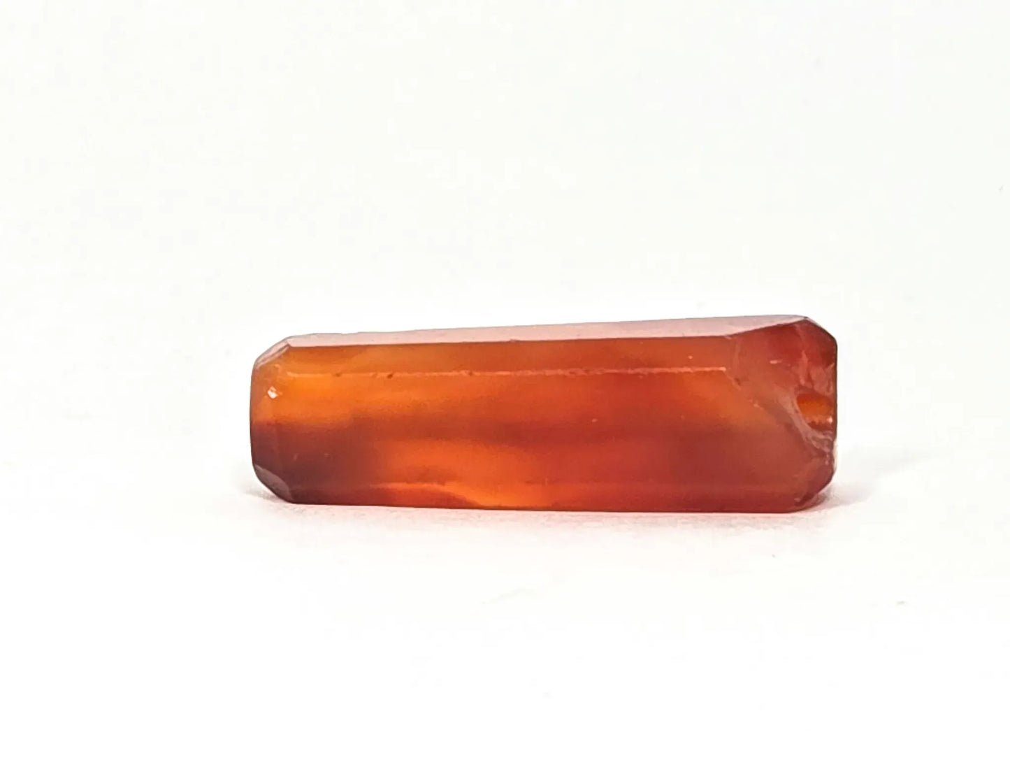 Ancient Indus Valley Beveled Carnelian Bead, 28.2mm, translucent orange-red, ancient chipping disclosed (Ac-071026-CBEV)