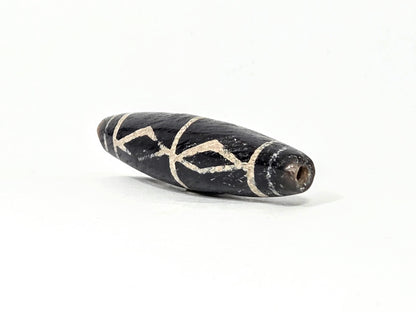 Ac-062426-3DS ancient three diamond spear agate dzi 49.1x12.2mm angled abrupt end small drill hole dark tip unretouched