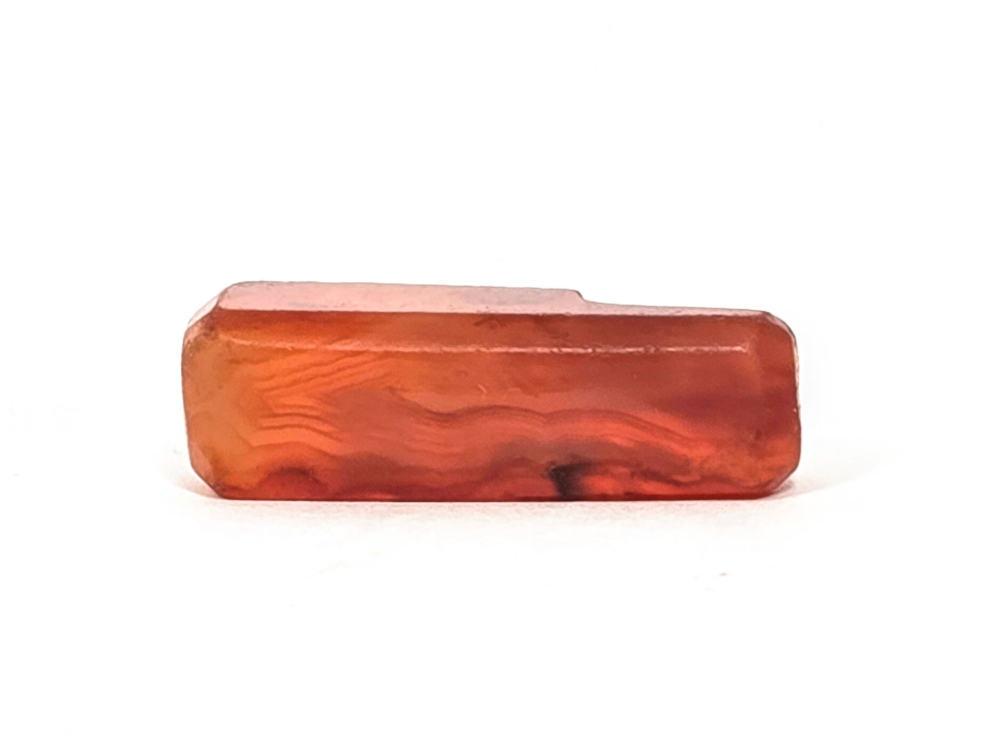 Ac-071026-CBEV2 ancient beveled carnelian vivid internal banding wave pattern face B chipping visible unretouch
