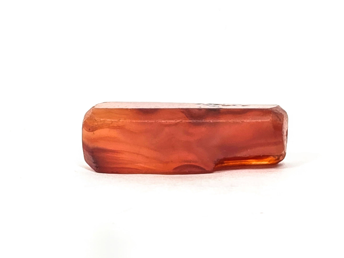 Ac-071026-CBEV2 ancient beveled carnelian orange-red face D flowing banding beveled edge visible unretouched