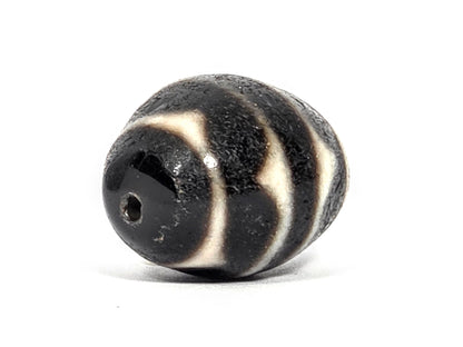 Ac-072326-RDW ancient round double wave dzi drill end B small chip at drill opening disclosed unretouched