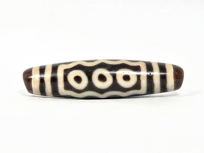 Ac-071026-7E ancient seven eye dzi 54.6x13.3mm dark brown agate three-eye face wavy border unretouched