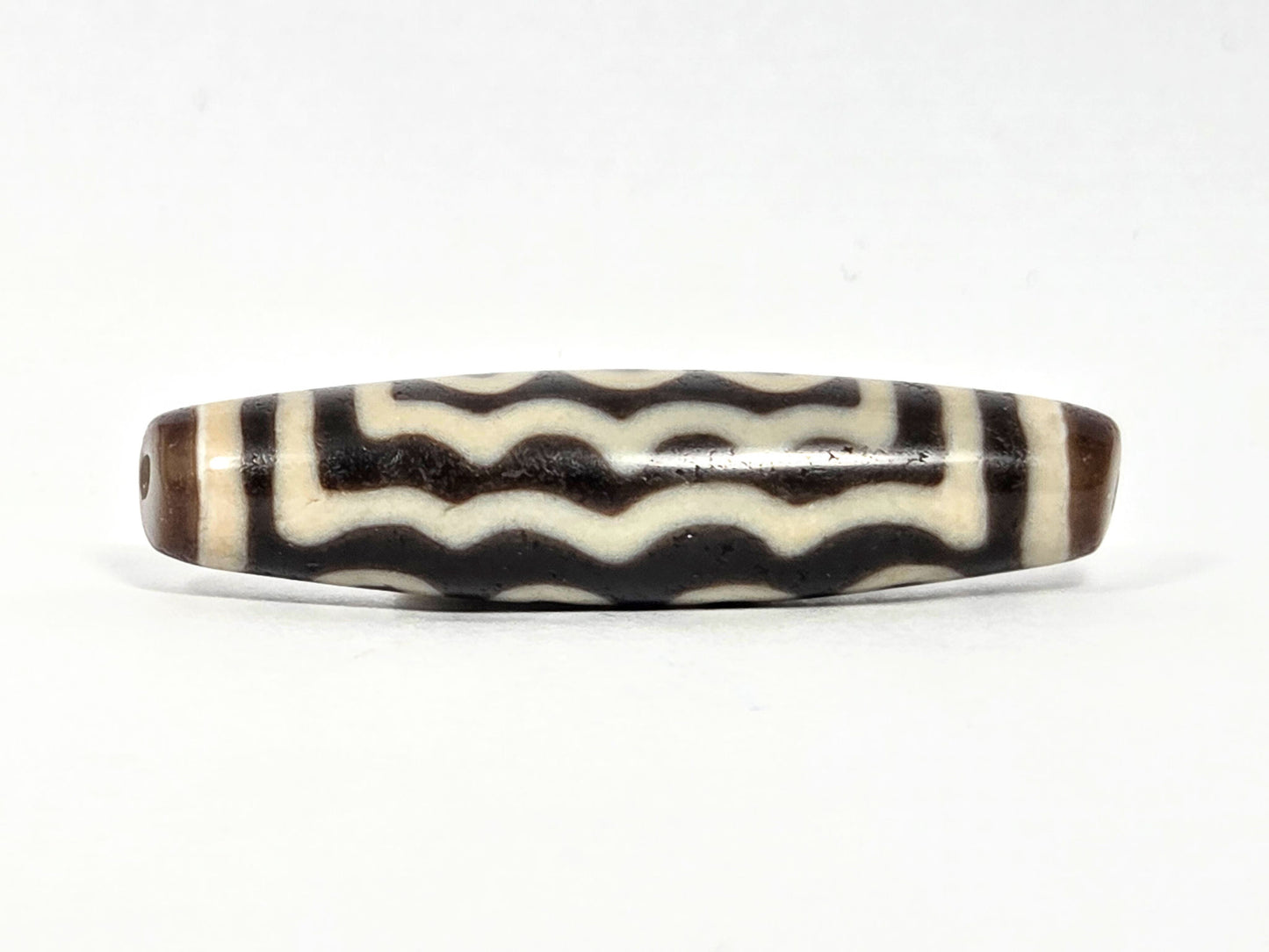 Ac-071026-7E ancient seven eye dzi dark brown agate wave face stacked horizontal lines drill hole visible unretouche