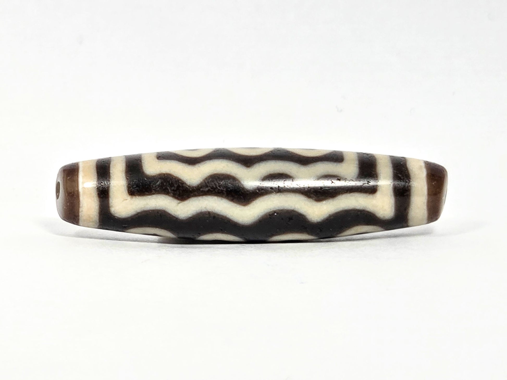 Ac-071026-7E ancient seven eye dzi dark brown agate wave face stacked horizontal lines drill hole visible unretouche