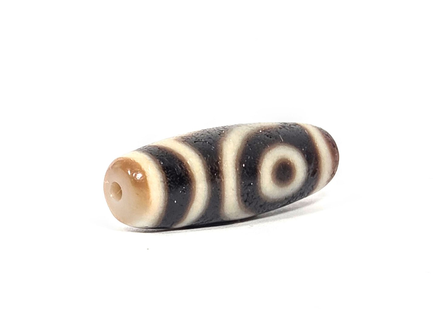 Ac-073026-2E2 ancient two eye dzi drill end A warm brown agate-internal colour clean drill hole unretouched