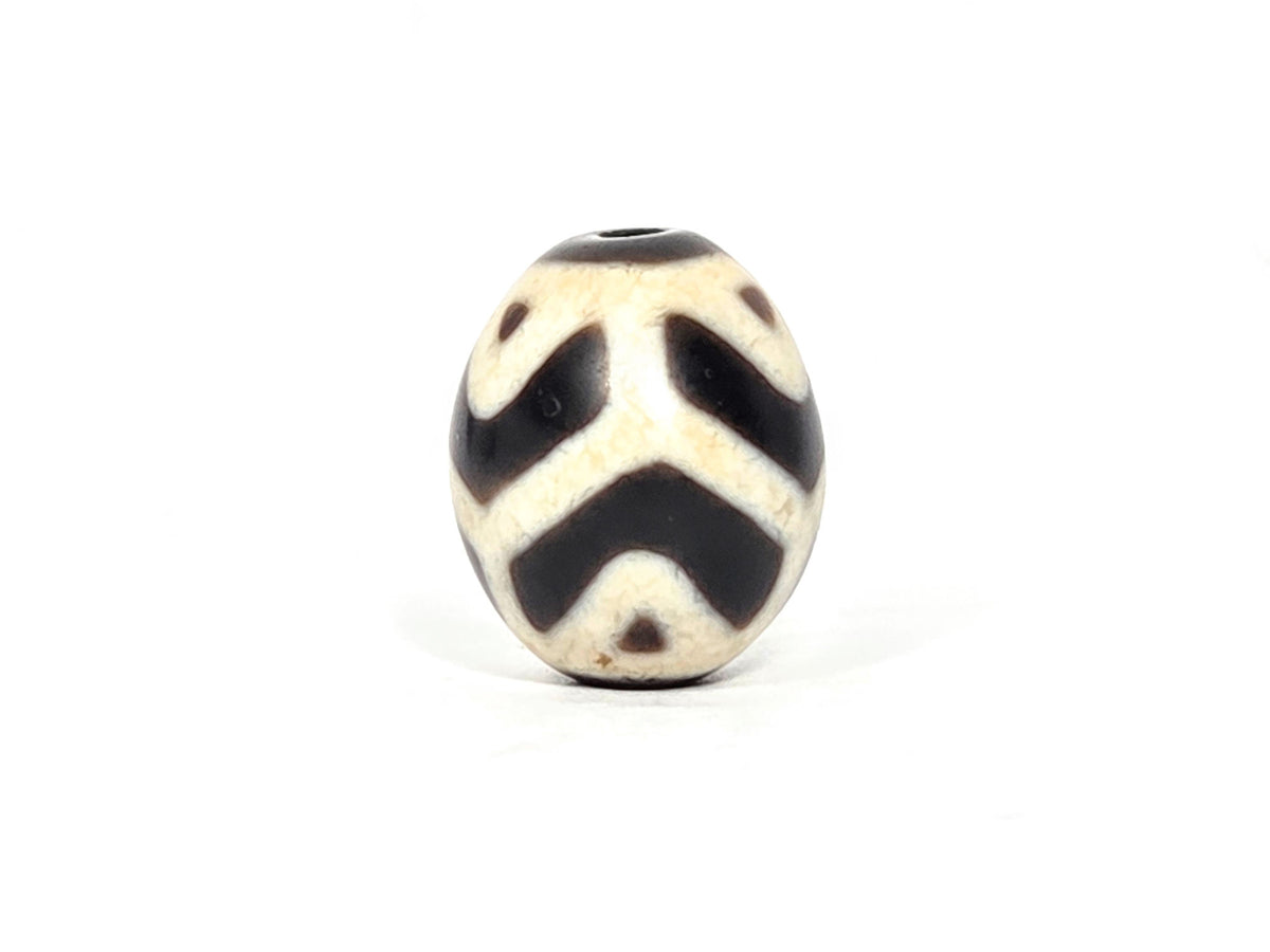 At-070826-RTTL antique round tiger tooth longevity dzi cream-ground agate third face dark chevrons drill top visible unretouched