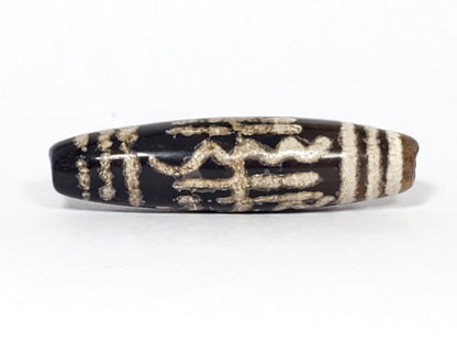 Antique Waves & Bars Dzi bead, 48.2mm — cream wave and bar etching on deep black agate, 200–300 yrs