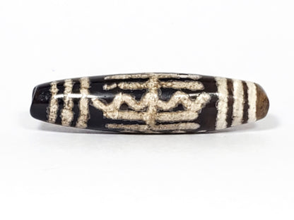 Third face of antique Waves & Bars Dzi — crown-like wave form, cream bar stripes both ends