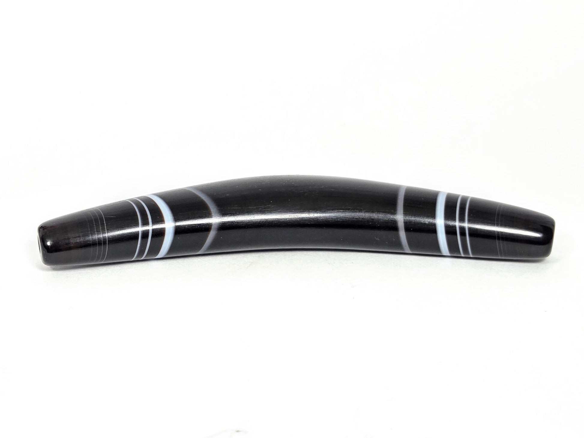 At-N-071126-BOW elevated front view, pitch-black ground confirmed, pale grey-white and blue-grey bands, unretouched