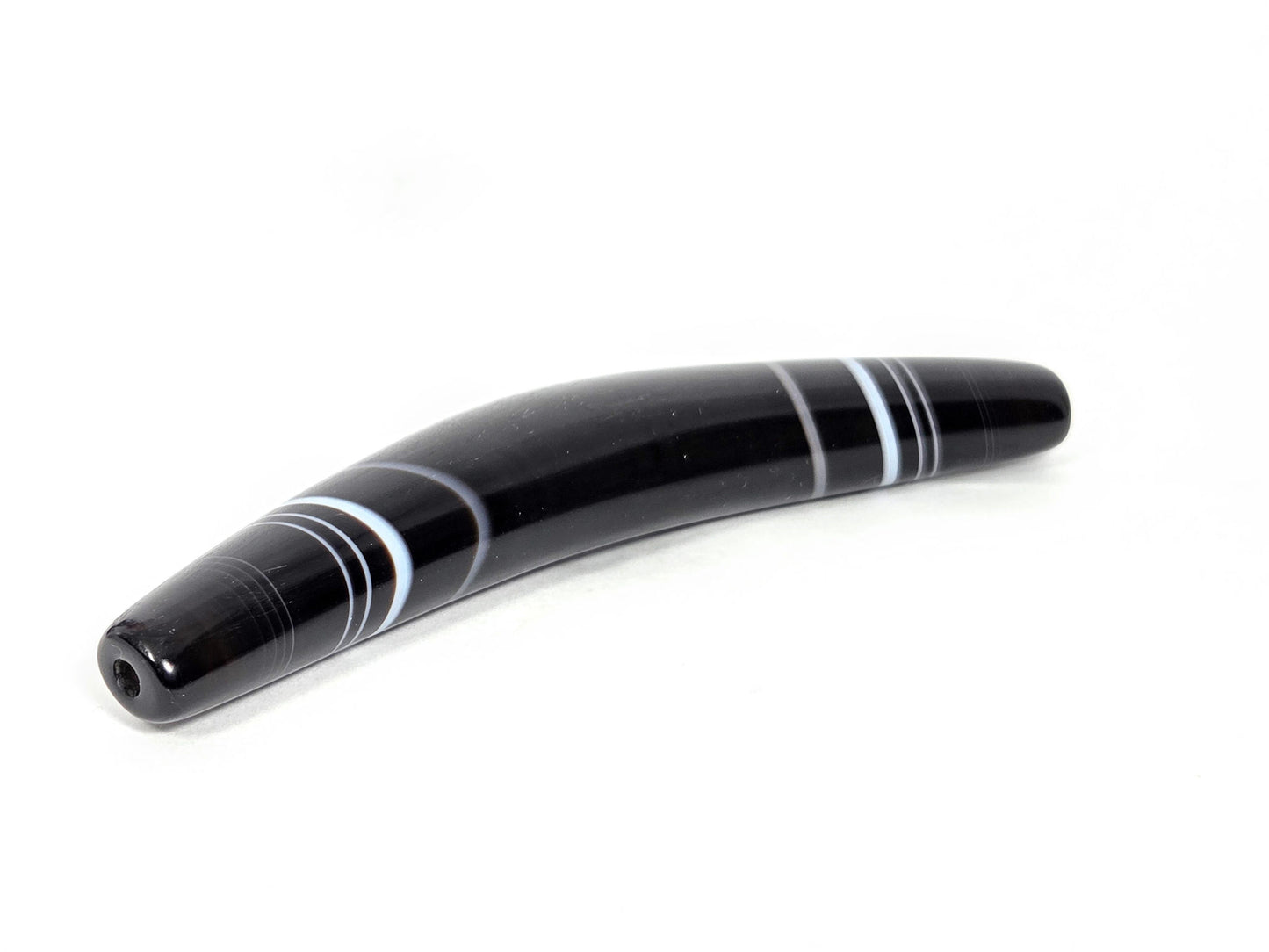 At-N-071126-BOW three-quarter view, wider tapered drill-hole end, pitch-black banded agate, unretouched