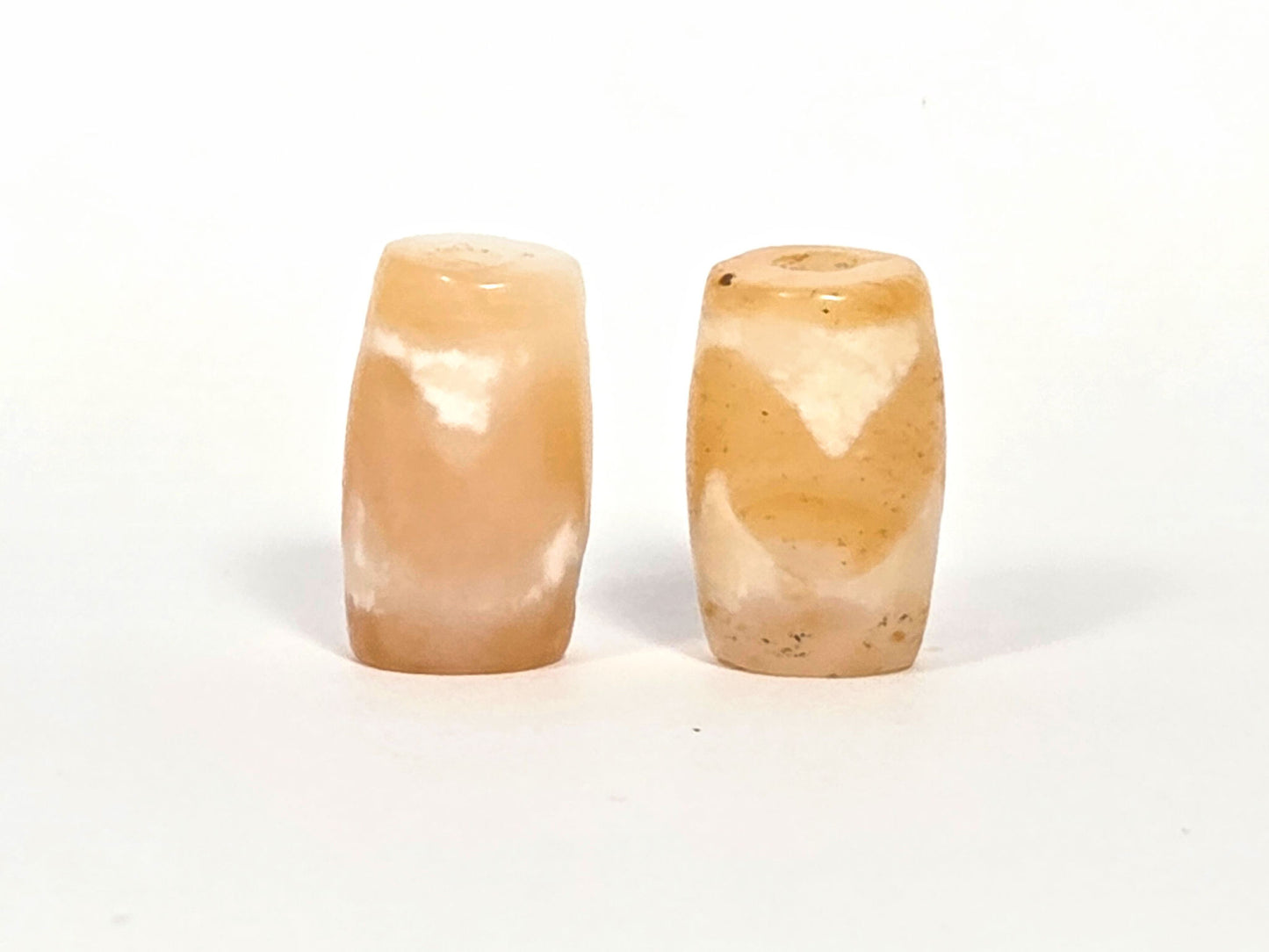 At-073026-WPair antique wave dzi pair top-down view drill holes pale & honey agate contrast unretouched