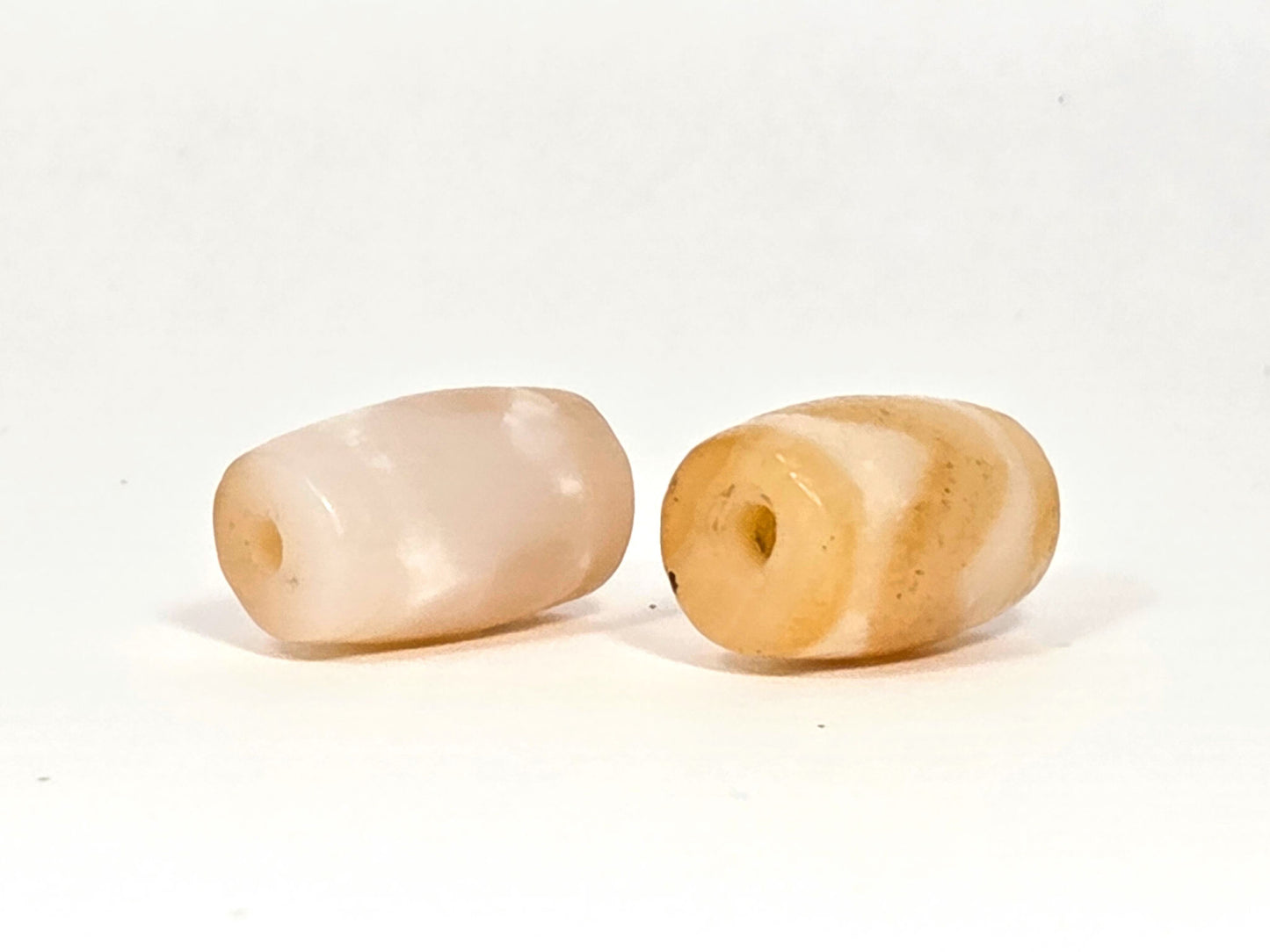 At-073026-WPair antique wave dzi pair drill end view pale bead cream-white honey bead banded unretouched