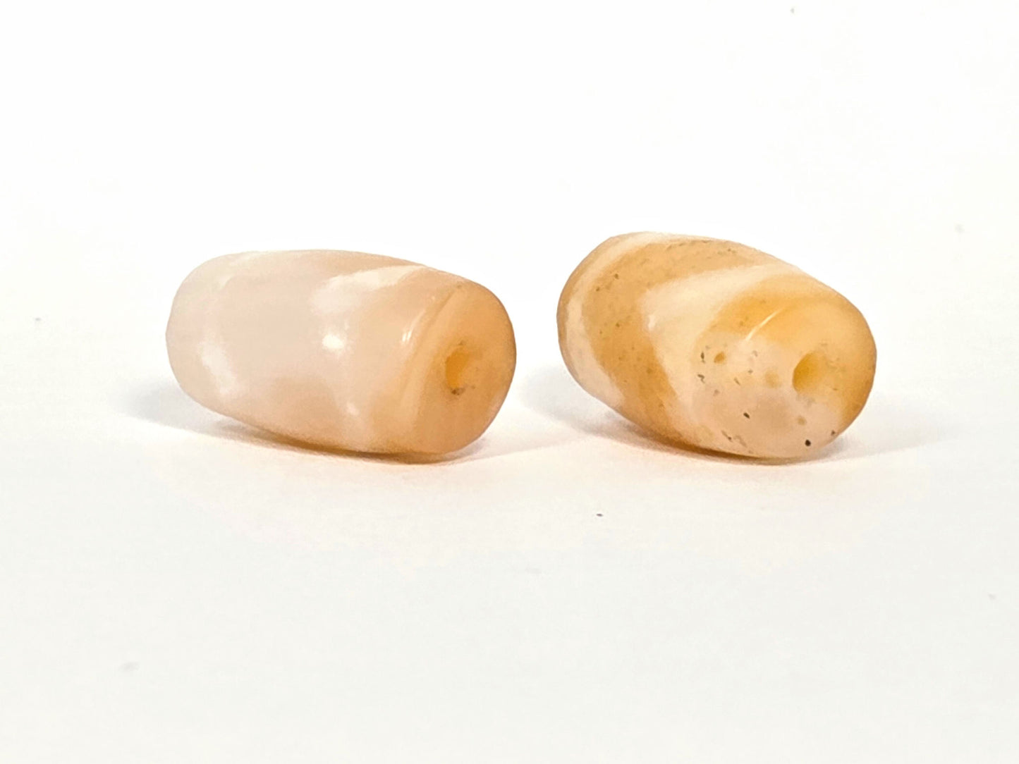 At-073026-WPair antique wave dzi pair opposite drill end pale bead honey bead wave banding unretouched