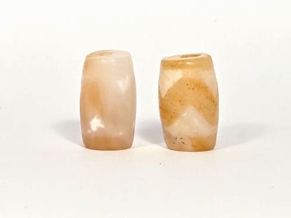 At-073026-WPair antique wave dzi pair face view pale peach-cream left honey ochre right unretouched