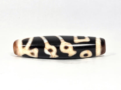 At-070726-TOLBS antique Tree of Life dzi pitch-black agate rotated face showing organic loop forms cream motif unretouched