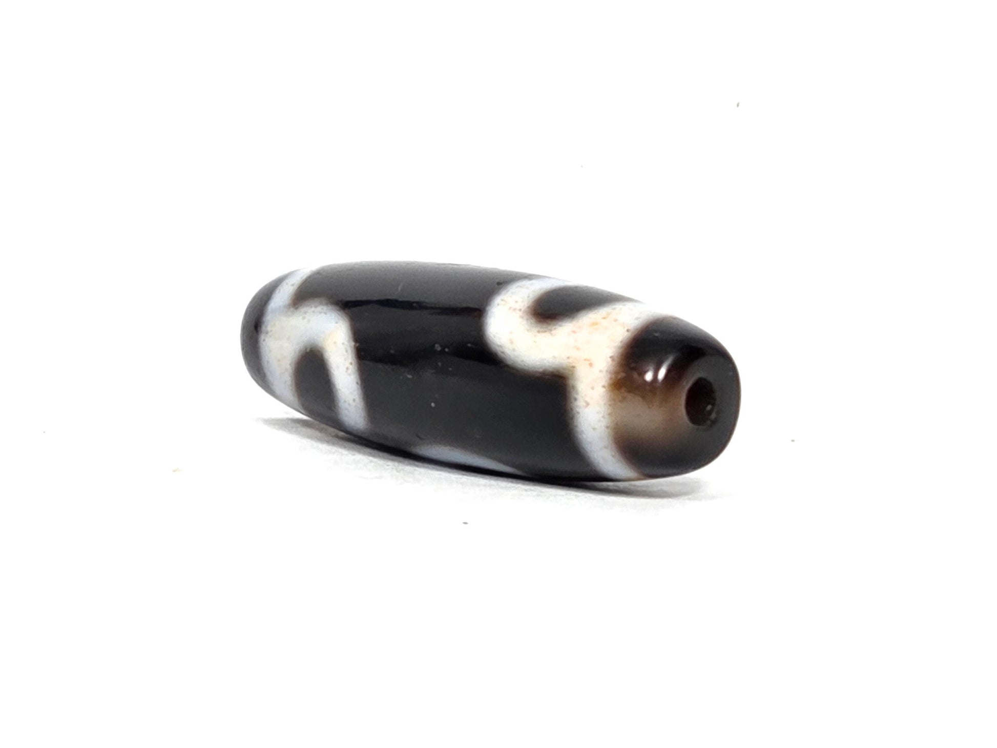 At-090526-RYBS antique ruyi dzi black agate angled drill end warm brown cap, unretouched