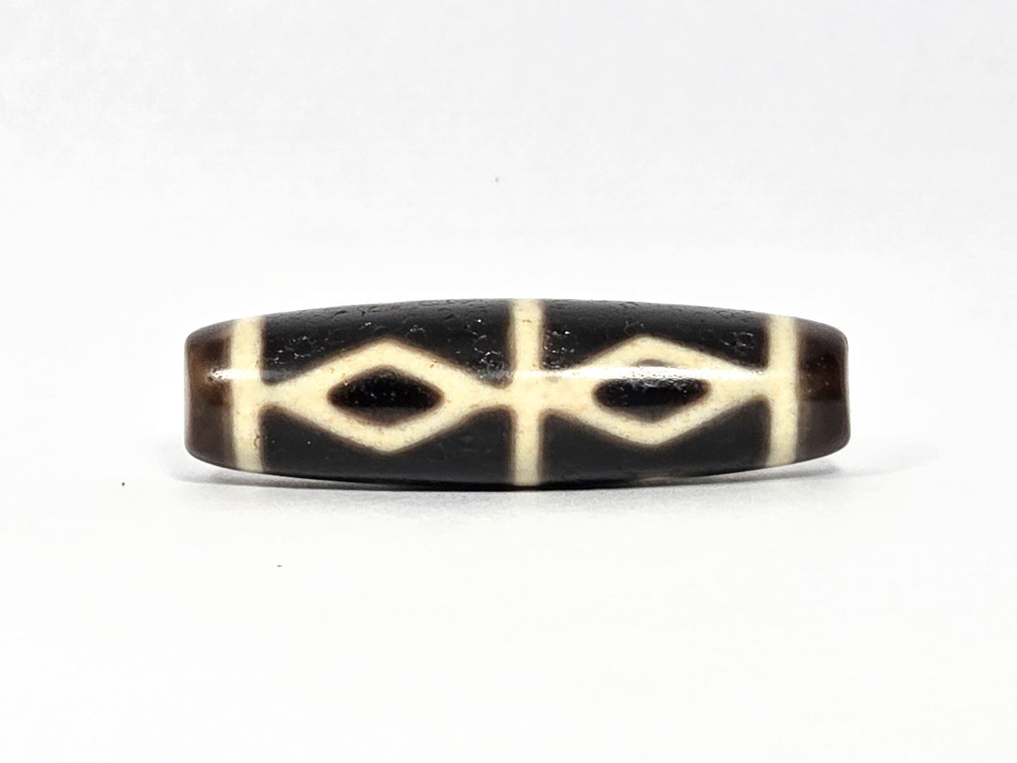 Six Eye Diamond Spear At-072226-6EDS 42.0×12.1mm pitch-black agate face A — diamond eyes, spear elements, unretouched. 