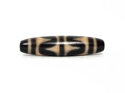 At-090226-DW7 antique double wave dzi black agate face B wave composition drill ends visible, unretouched