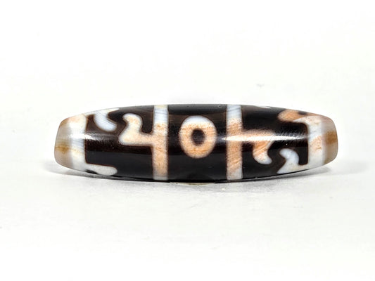 At-070626-GRRP3EBS hero flat, Guru Rinpoche three-eye dzi, 49.1×13.9mm, pitch-black & peach-brown agate, unretouched