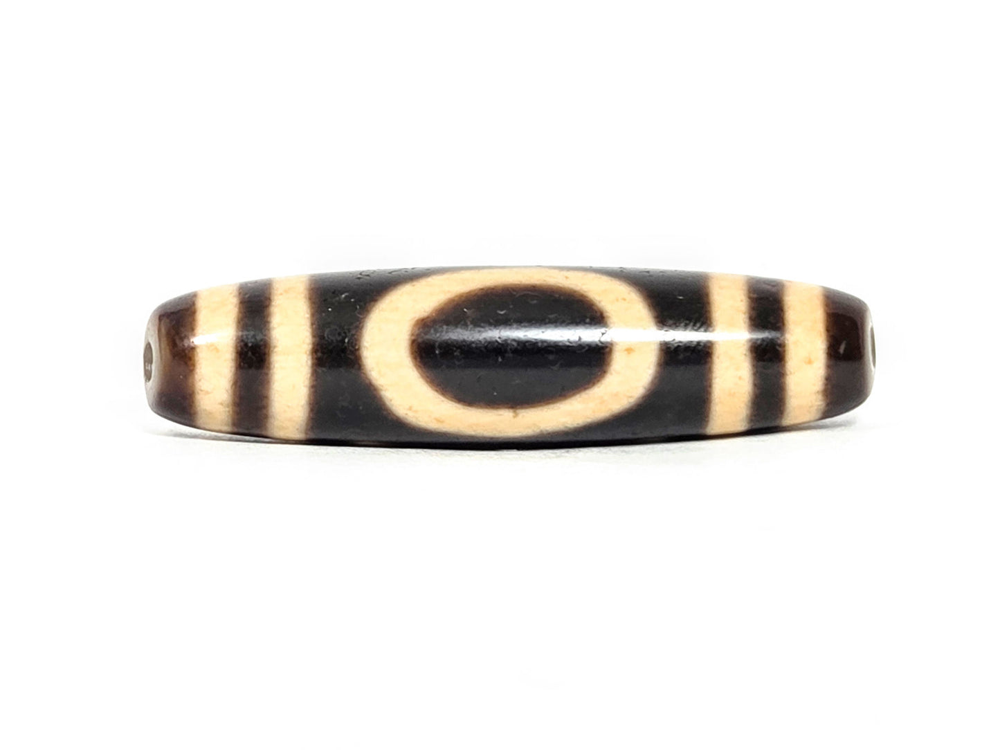 At-071326-HE face A, antique Heaven Earth dzi 48.4×11.9mm, very deep dark brown, cream oval, unretouched