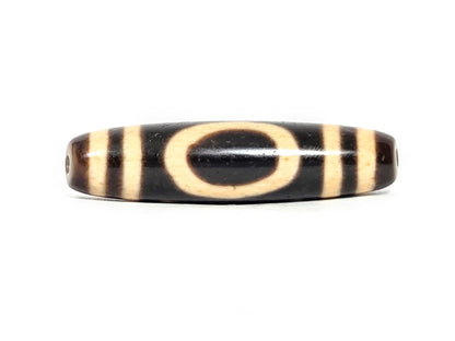 At-071326-HE face A, antique Heaven Earth dzi 48.4×11.9mm, very deep dark brown, cream oval, unretouched