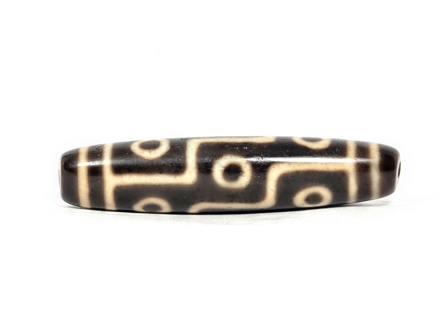 At-070826-9E antique nine eye dzi bead very dark brown agate second face rotated view nine eyes visible unretouched