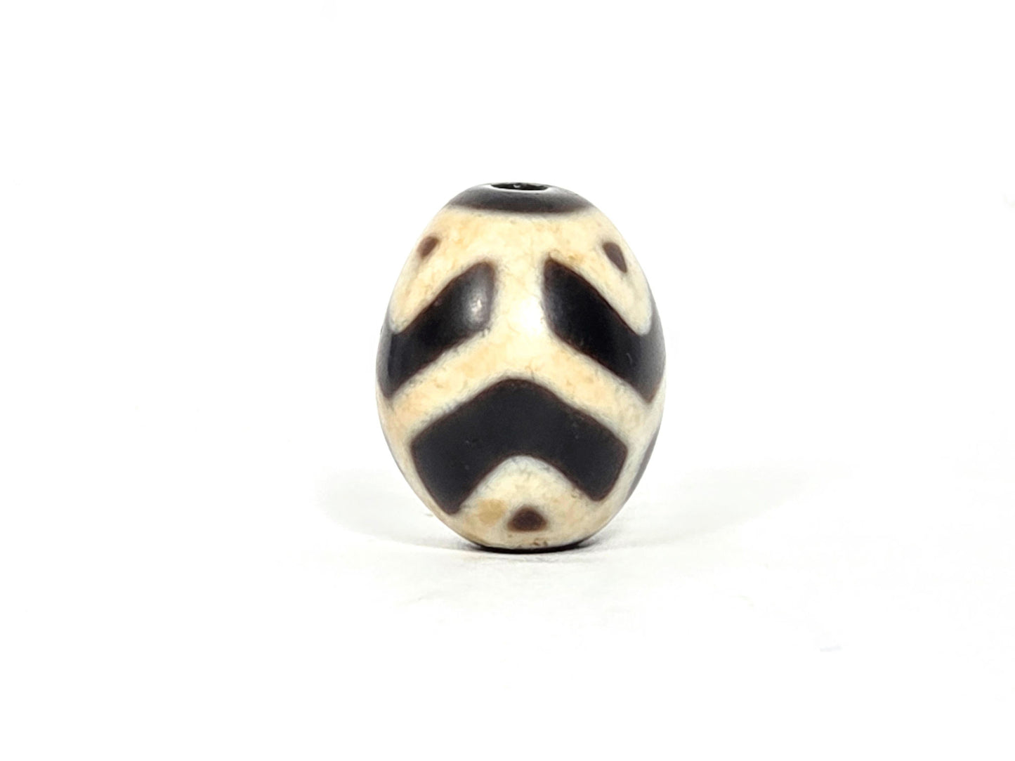 At-070826-RTTL antique round tiger tooth longevity dzi cream-ground agate second face rotated view tiger tooth chevrons unretouched