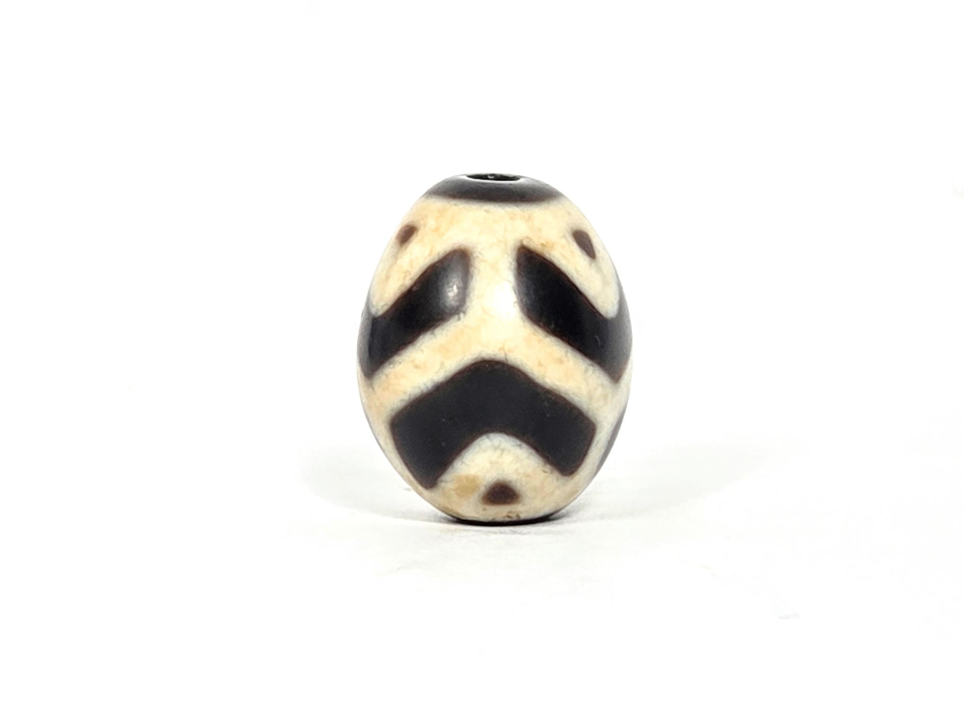 At-070826-RTTL antique round tiger tooth longevity dzi cream-ground agate second face rotated view tiger tooth chevrons unretouched