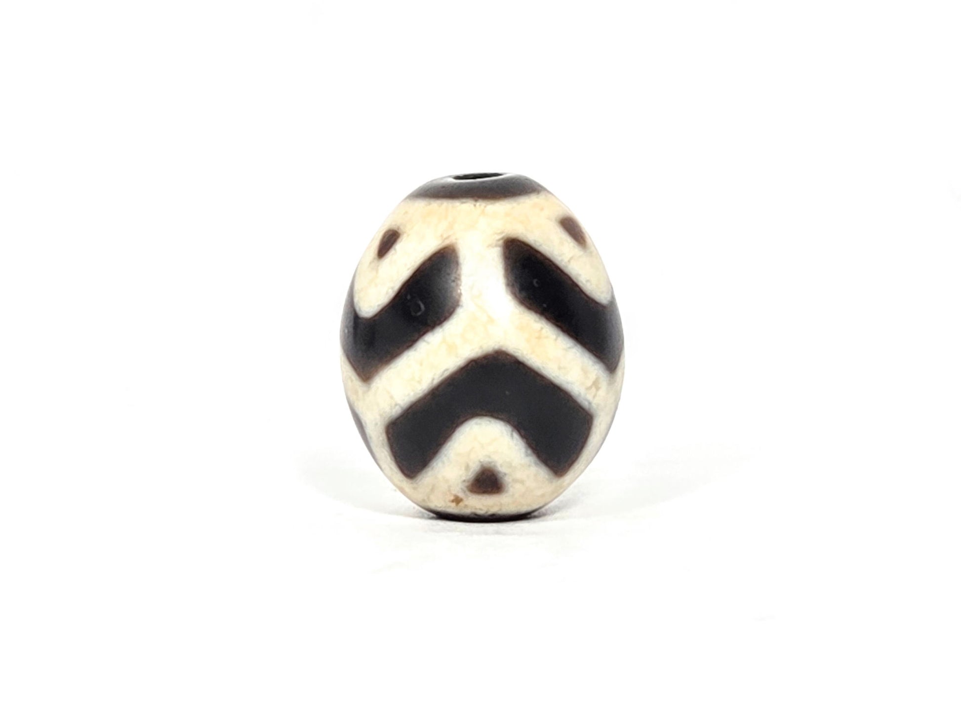 At-070826-RTTL antique round tiger tooth longevity dzi cream-ground agate third face dark chevrons drill top visible unretouched