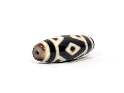 At-090126-3DETT antique three diamond eye tiger tooth dzi drill end view two warm brown banding unretouched