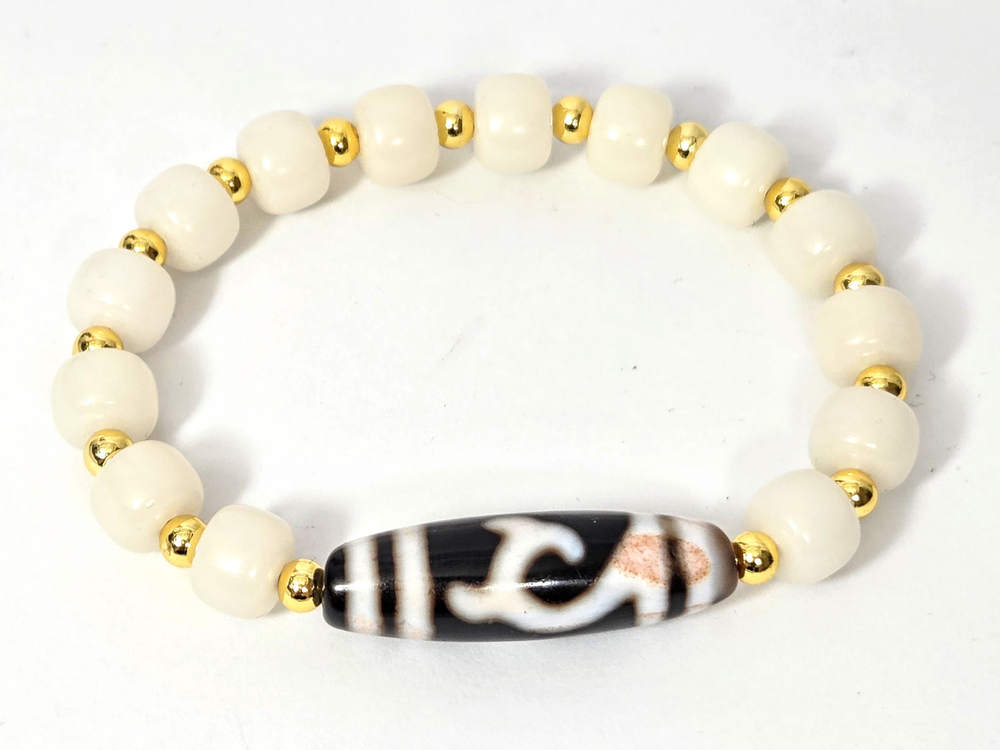 At-071026-GT-BR antique green tara dzi bracelet white bodhi root gold spacers flat overhead view unretouched