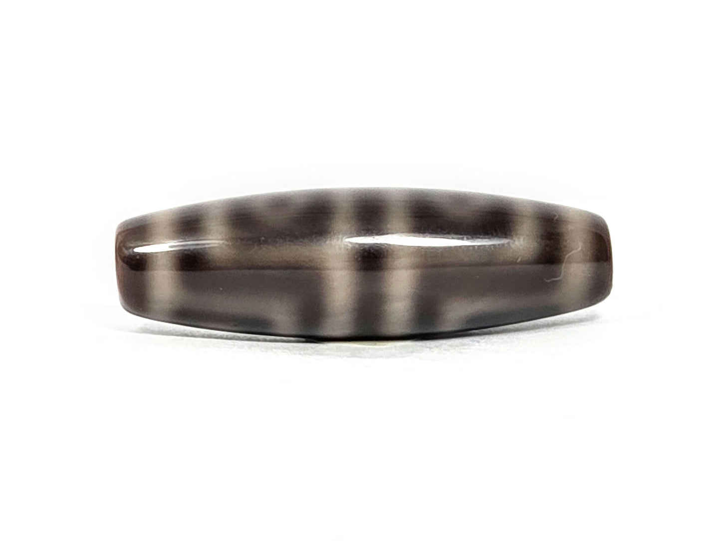 N-071126-4EV face B, grey-brown and grey-cream stripe banding, four eye motif not visible from this side angle, unretouched