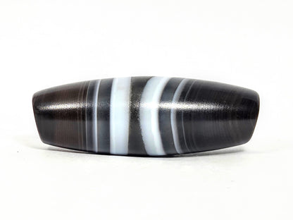 N-N-071026-1E3 natural one eye dzi banded agate bold white central stripe grey-blue flanking face C unretouched