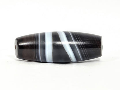 N-N-071026-1E3 natural one eye dzi banded agate full length diagonal bands both drill holes visible unretouched