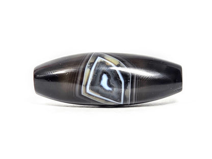 N-N-071126-1E-OLV3 primary face, diamond banding zone, deep dark brown-black olive dzi 41.5×15.3mm, blue-grey centre, unretouched
