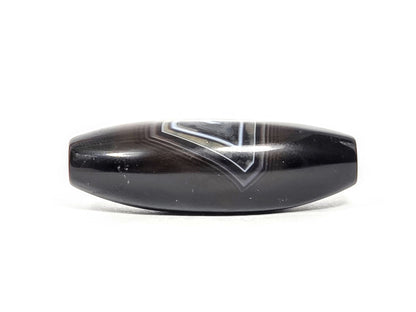 N-N-071126-1E-OLV3 rotated 90°, banding reads as broad V chevron, deep dark brown-black ground, unretouched