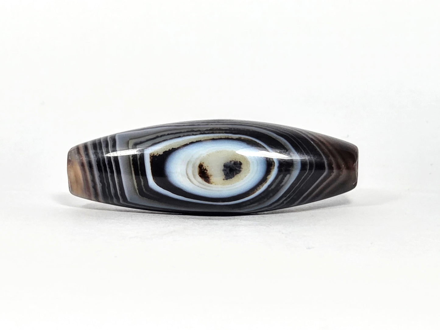 N-N-071126-1E-FCT eye face, naturally formed one eye, 44.4×14.6mm dark brown-black faceted banded agate, blue-grey eye, unretouched