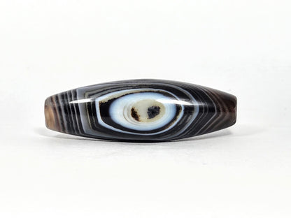 N-N-071126-1E-FCT eye face, naturally formed one eye, 44.4×14.6mm dark brown-black faceted banded agate, blue-grey eye, unretouched