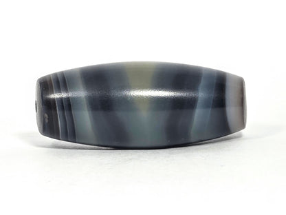 N-N-071426-1E4 natural one eye face B — cool blue-grey banding, charcoal accent lines, diamond eye visible, unretouched.