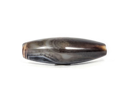 N-N-071126-1E-FCT back face, warm brown-caramel banding, no eye, fine surface micro-texture at centre disclosed, unretouched