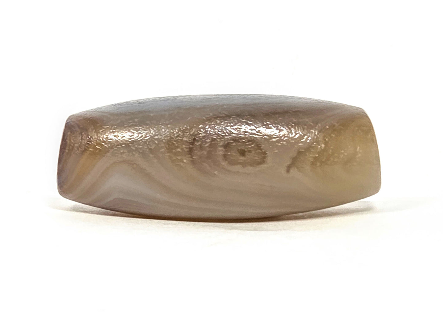 N-N-062126-1E2 dzi bead, opposite side profile, banding detail, unretouched