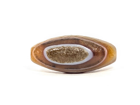N-N-071126-1E-OLV5 eye face, 36.8×16.1mm warm brown olive dzi, druzy crystalline eye centre, lavender-grey ring, unretouched