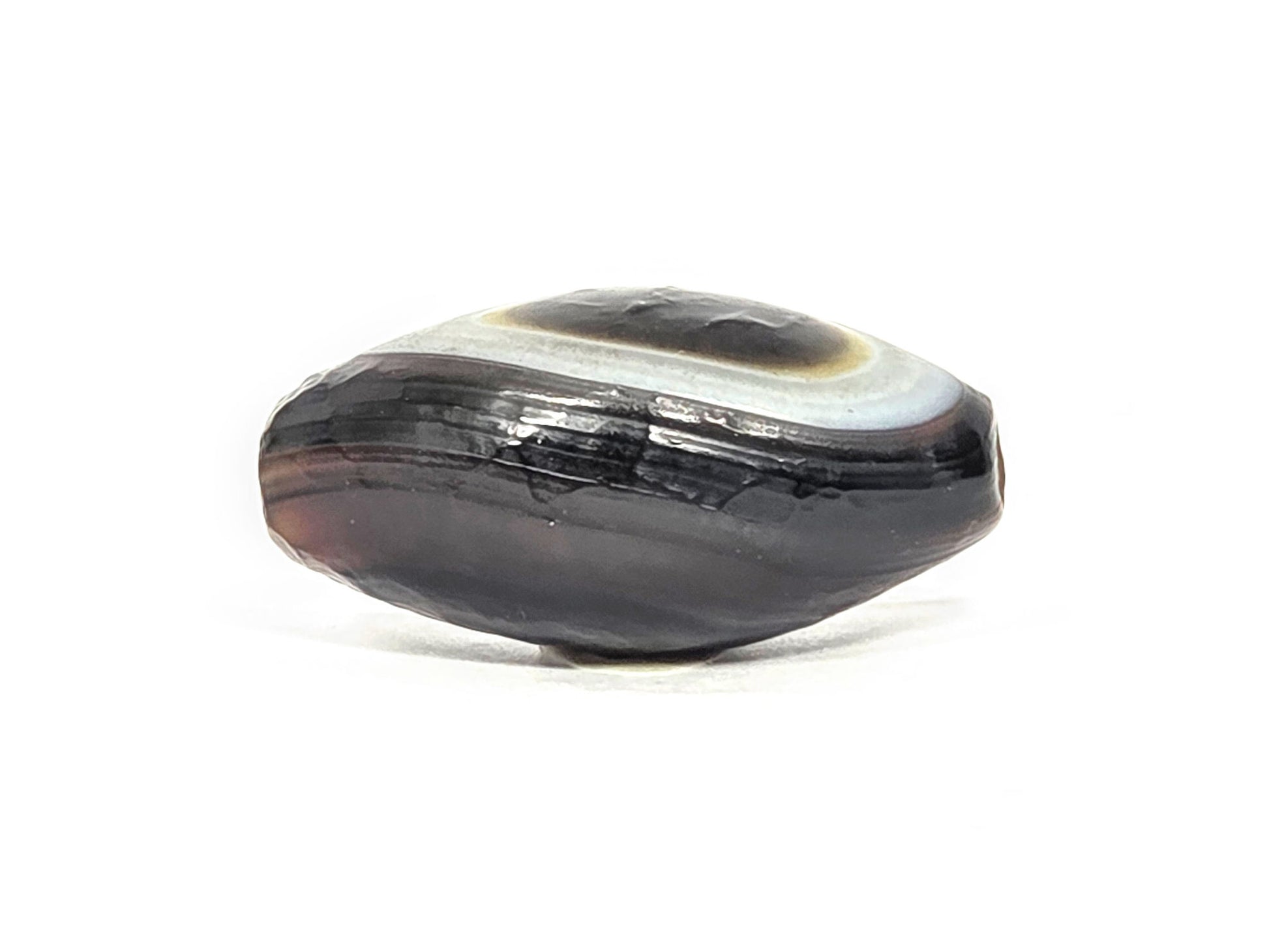 N-N-071026-1E-OLV natural one eye dzi dark brown agate partial white band opposite face raw edge unretouched