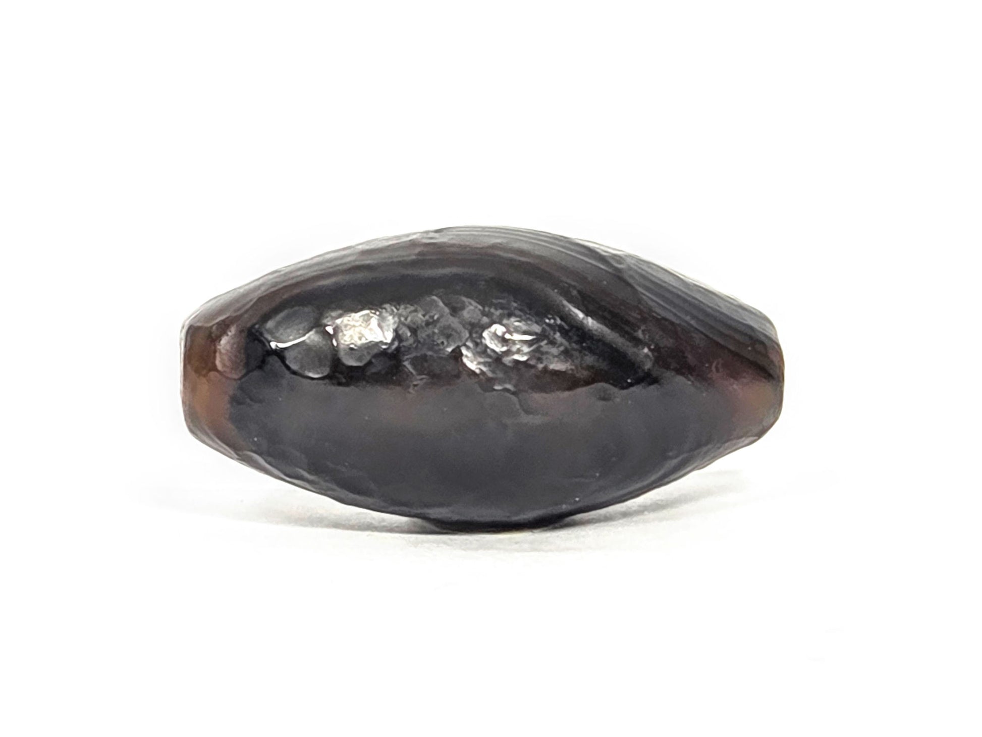 N-N-071026-1E-OLV natural one eye dzi very dark brown agate face C dark ground rough perimeter unretouched