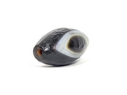 N-N-071026-1E-OLV natural one eye dzi angled view pointed drill end B white band visible raw edge unretouched