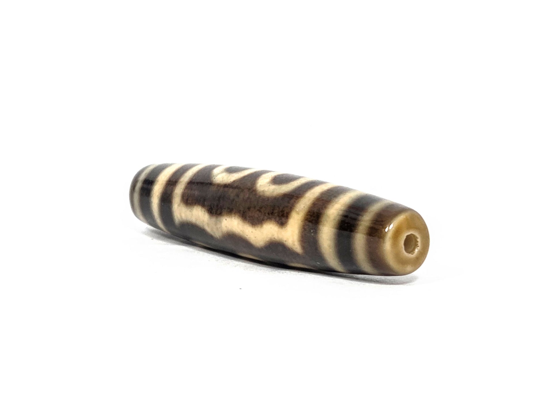 N-090126-5E new five eye dzi drill end view one warm honey-brown tip agate unretouched