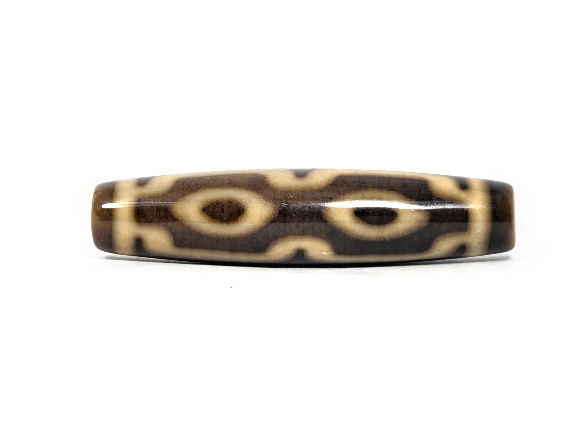 N-083126-4EV new four eye variant dzi 57.7x13.5mm warm brown agate almond eyes primary face unretouched