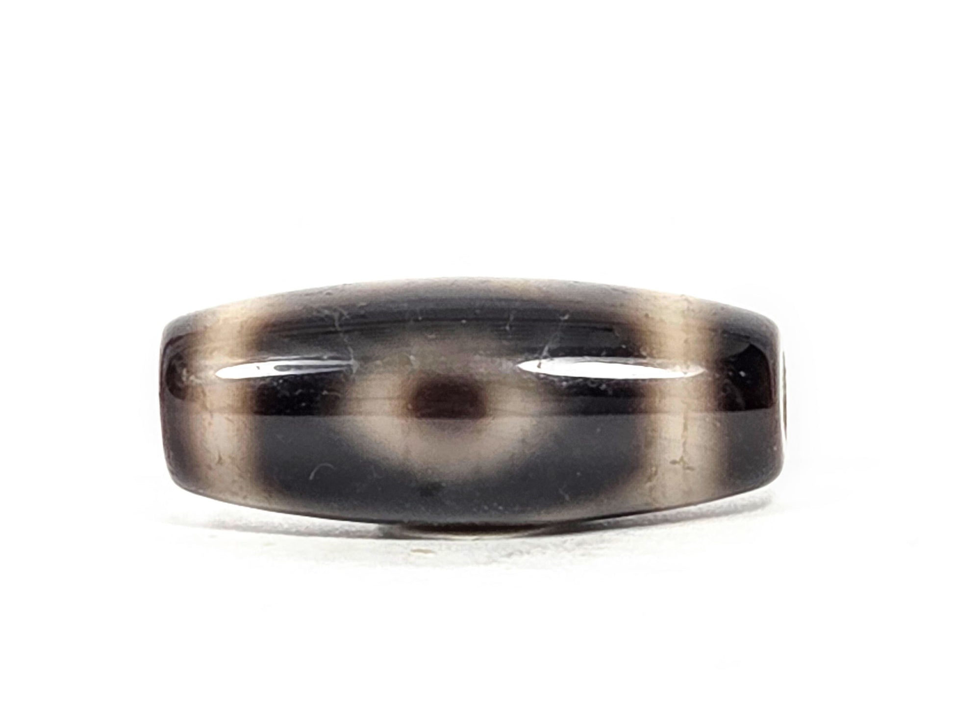 Two Eye motif N-FA-071426-2E face C — second eye view, cream equatorial band visible, dark agate, unretouched. 