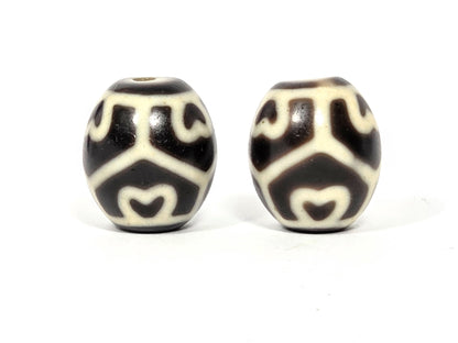 Pair of antique Tibetan Six Eye Lotus round Dzi beads, 17.7mm × 15.9mm and 18.0mm × 15.7mm — Side A showing Six Eye Lotus motif on deep brown and ivory natural agate — unretouched photo — Ancient Dzi Shop