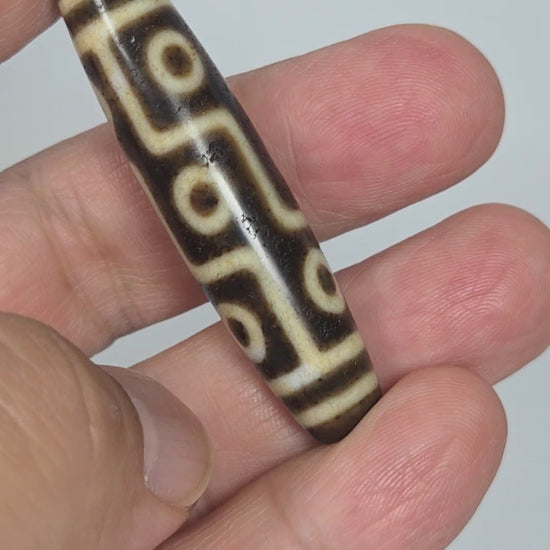 Ac-091626-9E ancient nine eye dzi 53.8x12.5mm dark brown agate rotating view all faces 500-800 years unretouched